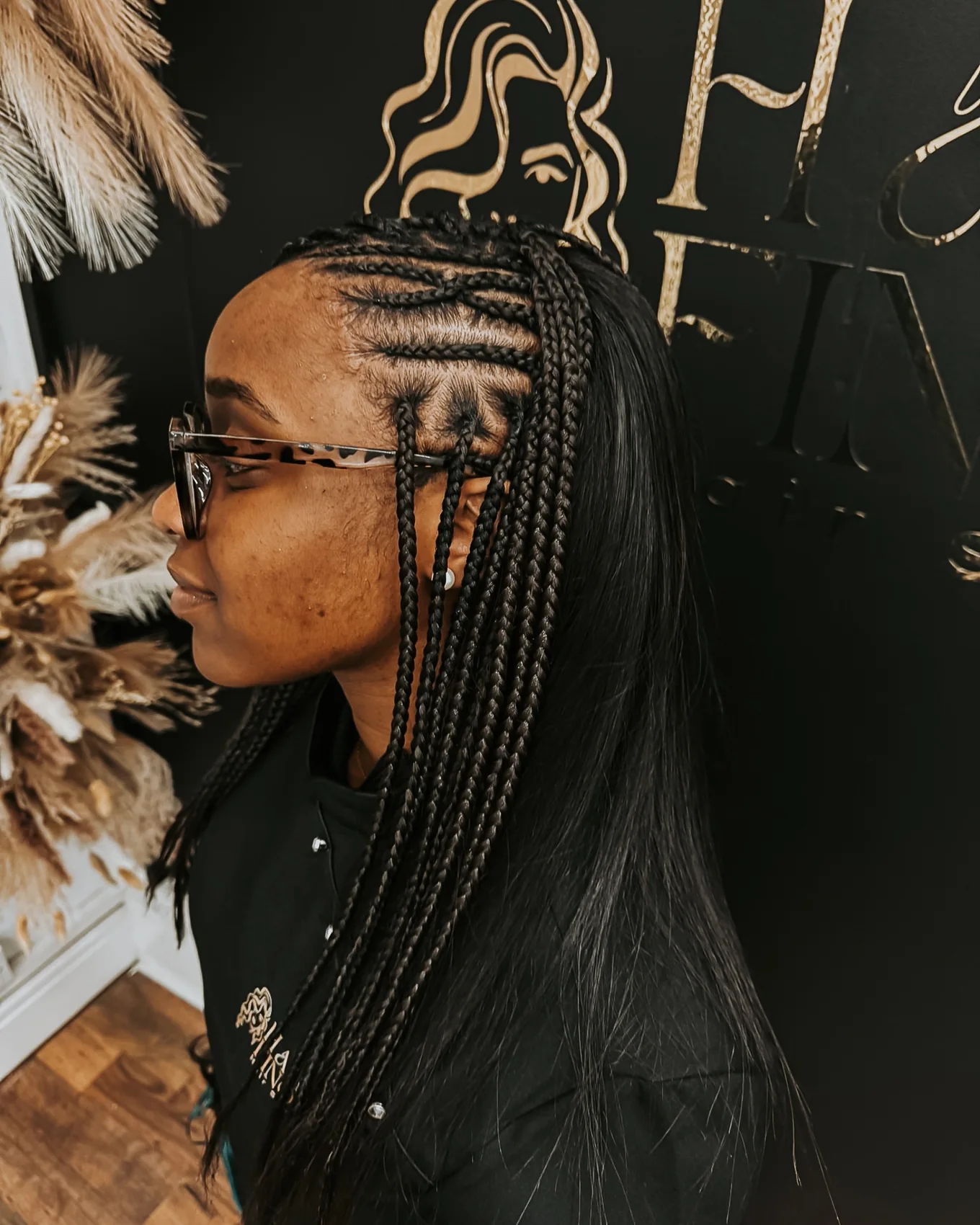 Side braided design combined with long straight hair