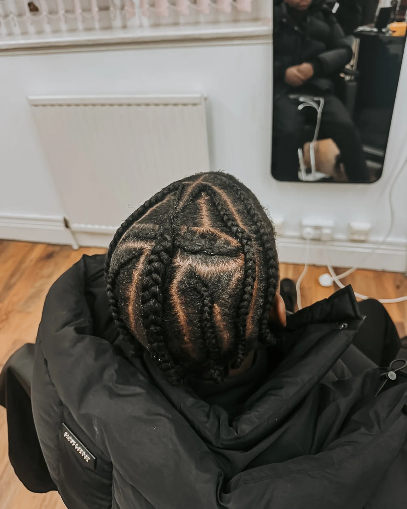 Detailed cornrow pattern viewed from above